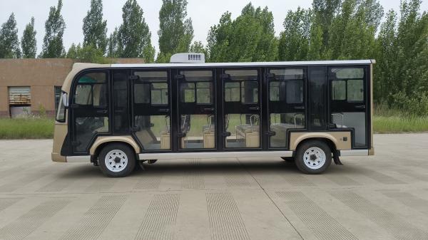 El autobús eléctrico de color marrón puede acomodar a 23 personas, el tipo de batería se puede seleccionar, el color y el LOGO se pueden personalizar, y tiene aire acondicionado incorporado