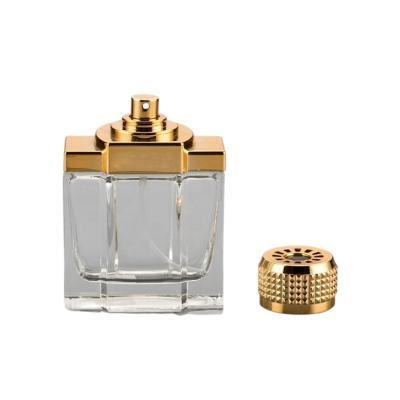 O pulverizador de perfume vazio do tampão plástico UV engarrafa a cor dourada de vidro do tampão 100ml