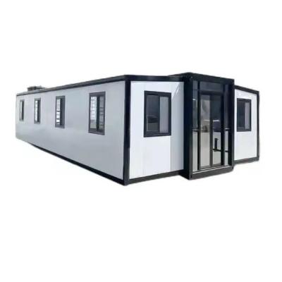 Casa de contêineres de expansão de asa dupla de 40 pés com design e teto de painel de sanduíche EPS