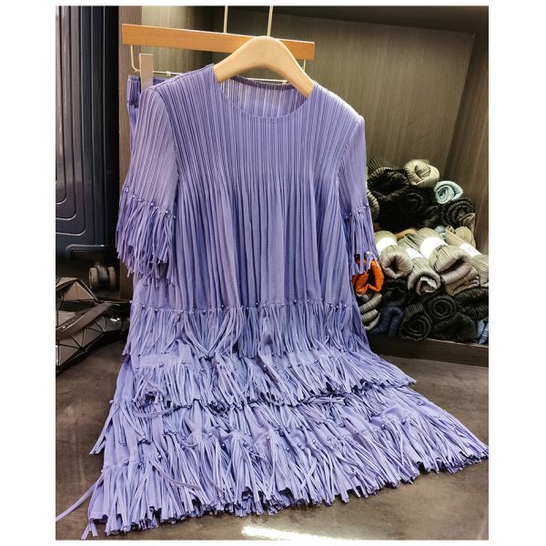 Women's High-End Casual Two-Piece Short-Sleeved Tops and Pleated Tassel Skirts Solid Pattern New Summer Fashion Suit