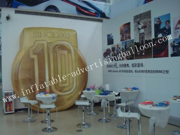 La coutume ignifuge a formé des ballons/forme gonflable de pièce de monnaie d'hélium de la publicité pour le salon commercial