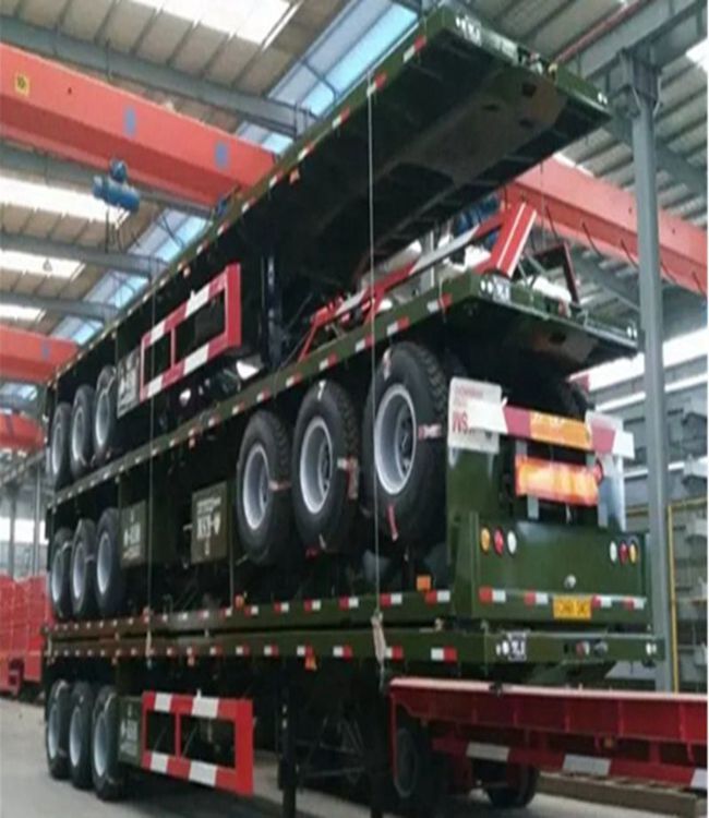 Многоосевой SINOTRUK 28FT 40 FT платформенный полуприцеп с плоской кроватью с более высокой грузоподъемностью и более длительным сроком службы