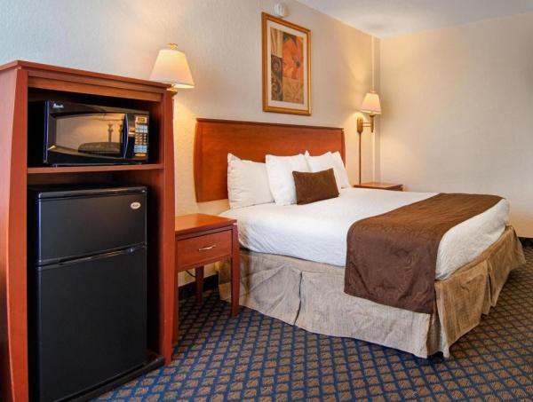 Sulawesi Celebes american style hotel room furniture by Cherry wood headboard Bed with Tall cabinet for TV and wood desk