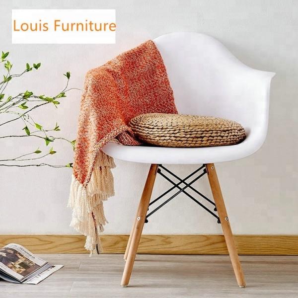 White Plastic Dining Chairs With Wooden Legs Crossover And Triangular Designed