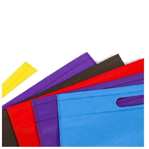 O corte não tecido amigável não tecido colorido segurado de Eco D dos sacos reusáveis leva o saco