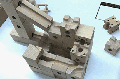 Les puzzles en bois de développement de PCs intellectuels du jouet 46 marbrent les blocs constitutifs courus