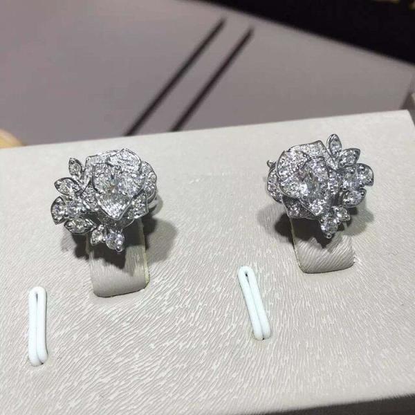 Piaget brand jewelry 18kt  Piaget Rose earrings in 18K white gold set with 72 brilliant-cut diamonds (approx. 0.45 ct).