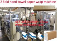 Máquina automática de embalaje de toallas de papel interplegadas con envoltura de manga de papel