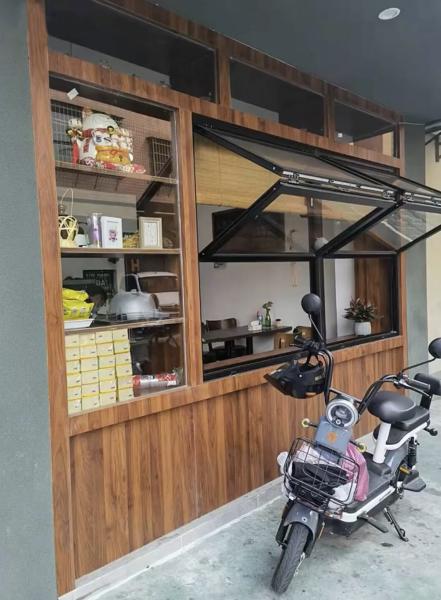 City Garden Folding Window Portal Enabling Vertical Farming Access from Apartment Living Spaces