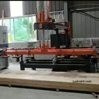 Machine de chargement et de déchargement de planches en bois contrôlée par PLC