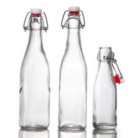 Garrafas de vidro de design personalizado 200 ml 250 ml garrafas de vidro de suco com tampa de balanço