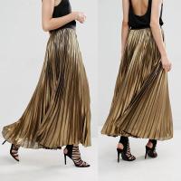 O ouro do projeto das saias da roupa das mulheres do serviço feito sob encomenda o mais tarde plissou por muito tempo a saia