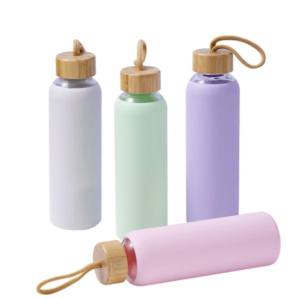 Venta al por mayor de botellas de agua de vidrio hermético de 18 onzas con FDA-certificado BPA-libre de descuentos de volumen + grabado con láser