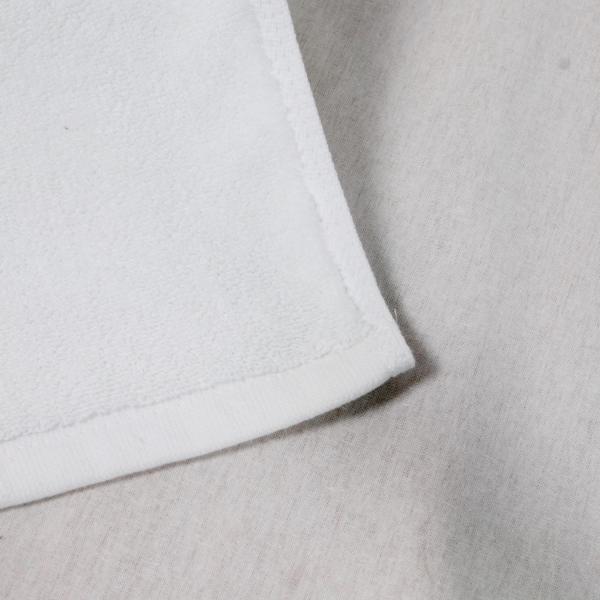 Полотенце белизны снега воды подшитое вещество-поглотителем