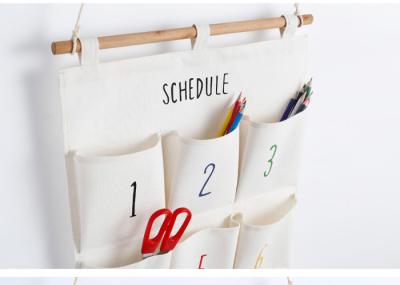 Puting hanging storage bag pockets organizer door wall chest holder customized Arabic numerals