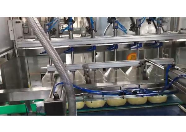 4 Nozzles 25L Edible Oil Bottle Filling Machine 415v Engine Oil Packing Machine