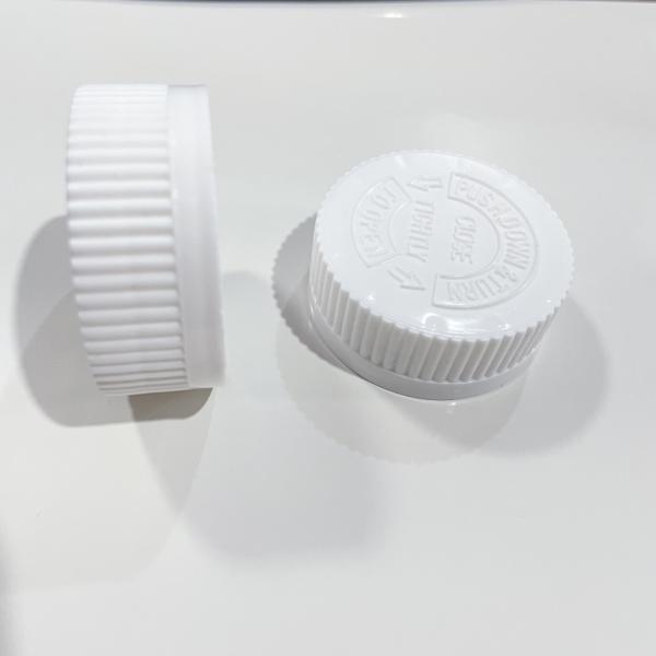 Capa de plástico resistente a los niños de 38 mm con tapa de tornillo para botellas de plástico asequible