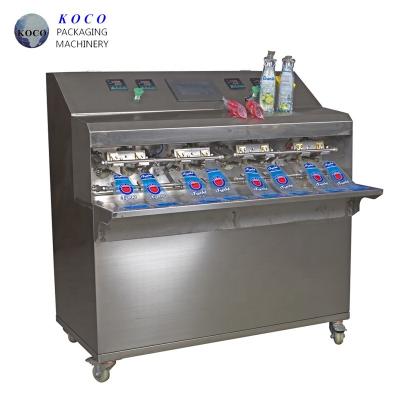 KOCO 2020 hot selling KY - 8 liquid water, juice, milk filling and sealing machine