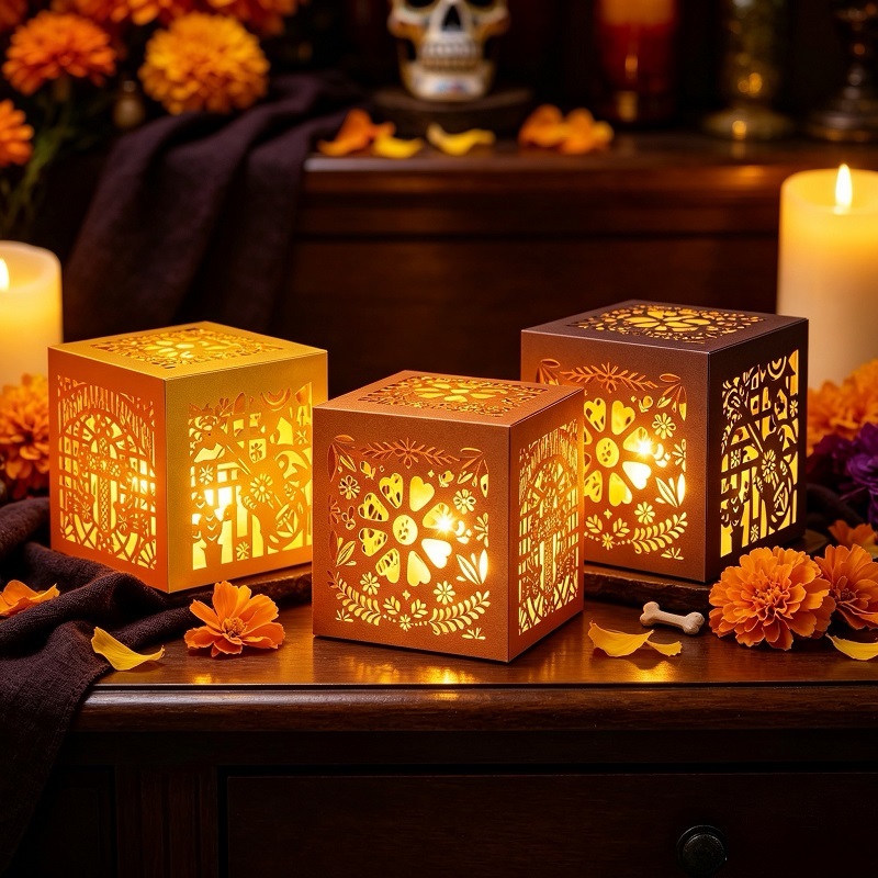 Mini paper luminaries with calavera cut-outs for ofrenda altars
