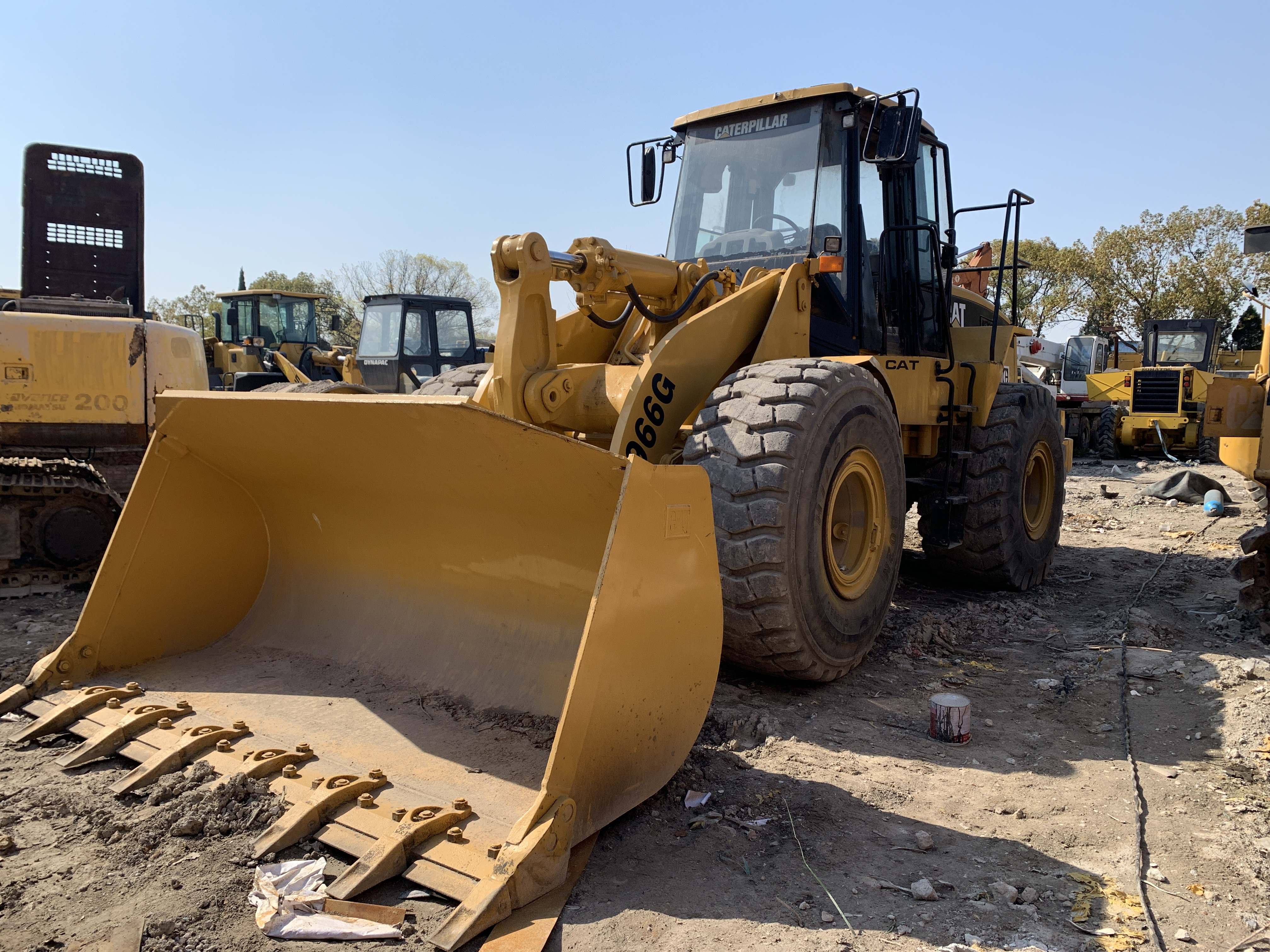 253hp CAT 966G использовал затяжелитель колеса с 4 передними шестернями