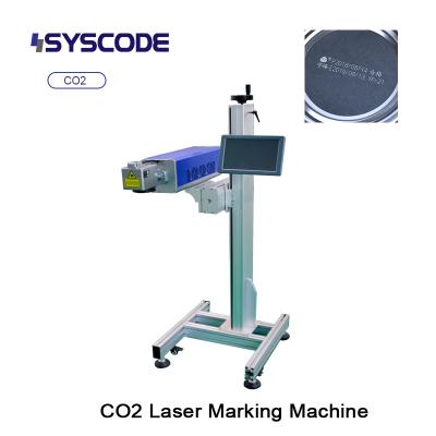 Automated CO2 Laser System - Production line integration. PLC compatible, 360° rotatable head for irregular products.