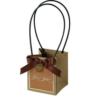 Impressão de logotipo personalizado Bolso de mantimentos Bolso de presente de papel Kraft branco marrom Bolso de papel craft bonito com alça