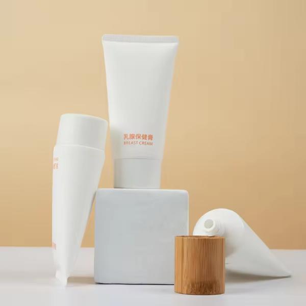 Tubos plásticos vacíos para cosméticos Tubos blancos para el cuidado de la piel Embalaje personalizado con tapa de bambú