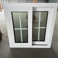 Construcción residencial Ventanas deslizantes de PVC con doble acristalamiento con parrilla