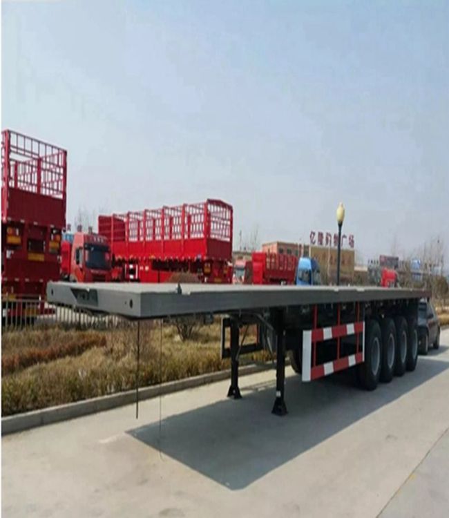 Многоосевой SINOTRUK 28FT 40 FT платформенный полуприцеп с плоской кроватью с более высокой грузоподъемностью и более длительным сроком службы