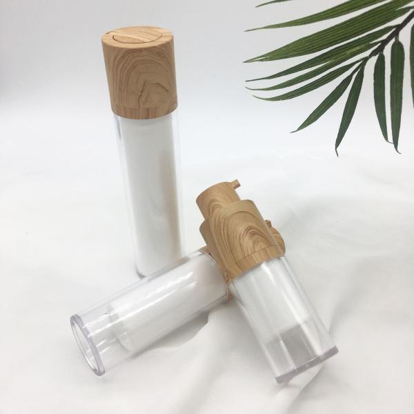 Hot sale white dual rotary bamboo airless vacuum pump cosmetic lotion bottle