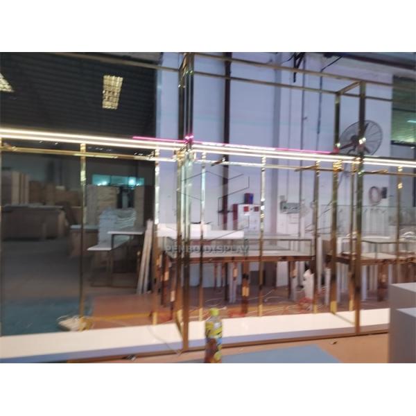 Гальванизируйте стальные выставочные витрины одежды бутика с освещением T5