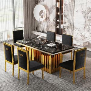 Une table à manger moderne avec un haut en marbre pour plus de fonctionnalité