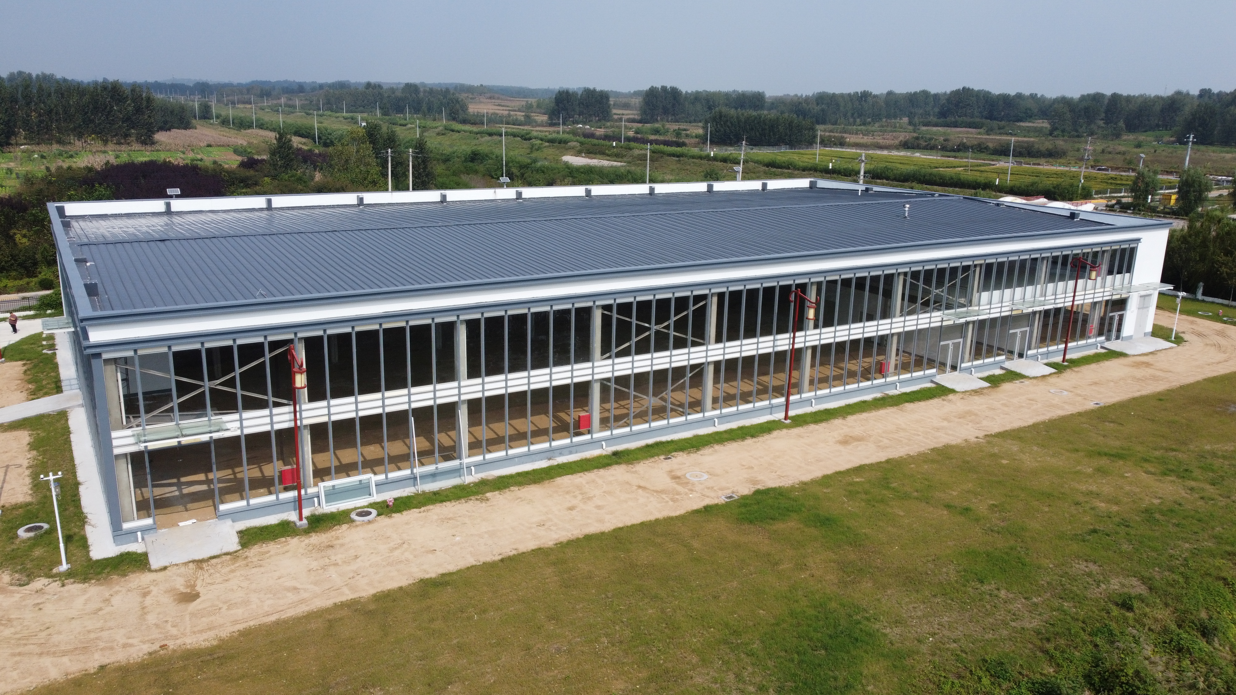 Custom Prefabricated Steel Structure Warehouse Q355B Main Frame Equivalent ASTM A572 Gr50 for Industrial Storage Plant