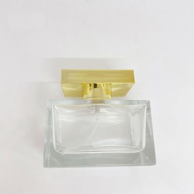 Garrafa de perfume 100ml criativa com empacotamento do cosmético da baioneta da garrafa de vidro da garrafa do pulverizador do tampão de Zamak