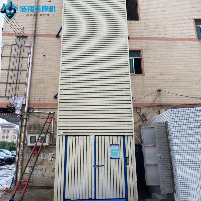 380V Vertical Mezzanine Floor Lift 500kg-50T Load Goods 5M-50M Stroke Manual Auto