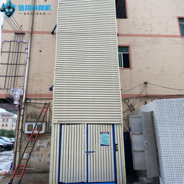 380V Vertical Mezzanine Floor Lift 500kg-50T Load Goods 5M-50M Stroke Manual Auto
