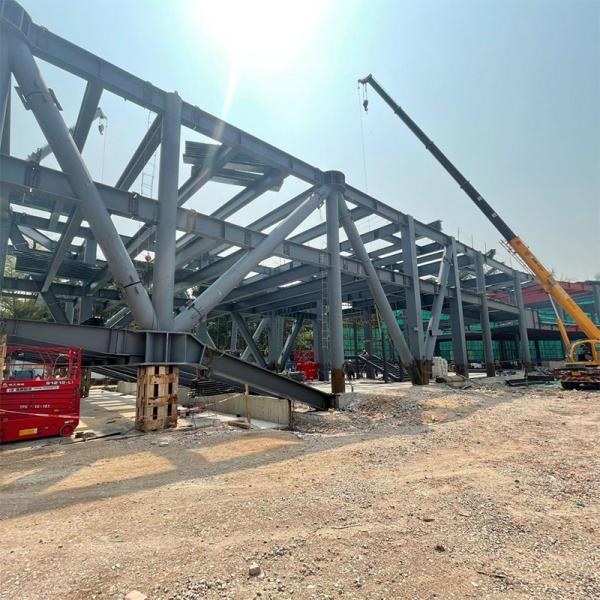 Solid H-shape Steel Beam Customized Steel Frame Hangar Workshop Warehouse with Water Proof and Hurricane Proof Features