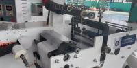 Machine rotative automatique de découpe et de refente d'étiquettes adhésives de haute précision