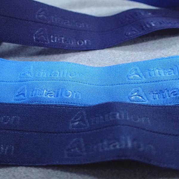 O sutiã elástico tecido de nylon do jacquard prende com correias para a roupa