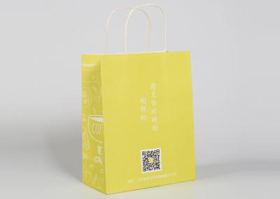 O papel torcido segura sacos de compras feitos sob encomenda para a embalagem do presente e da roupa