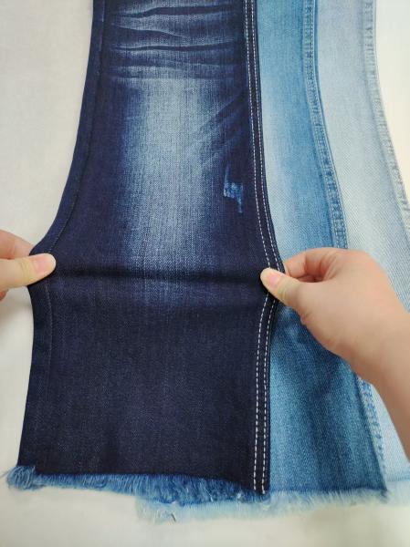 Siro Yarn Cross Slub Estiramiento débil 85% algodón Tejido denim 8+8*10/40+70 construcción JSD3300 Para pantalones vaqueros o chaqueta