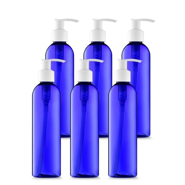 Голубая оранжевая пластиковая косметическая бутылок бутылка насоса лосьона расслоины не