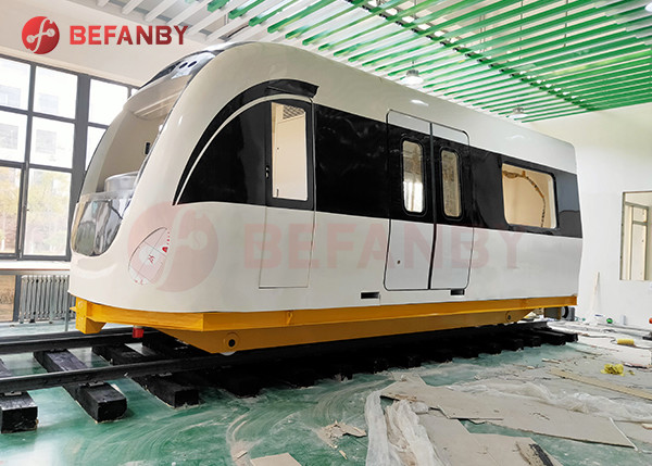 Carretilla eléctrica remolcada de la manipulación de materiales del carril del cable 5 toneladas