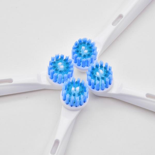 Supérieur élimination de la plaque sonore électrique brosse à dents de remplacement de la tête pour les dents sensibles