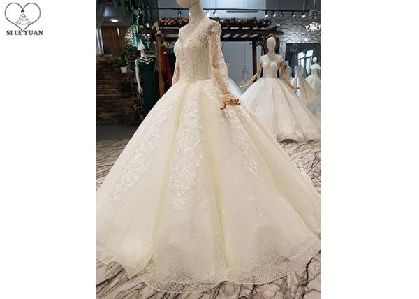 Ivory Long Sleeve High Neck Bridal Gowns Backless Sweep Train Special Beaded Net