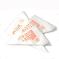 Petit gâteau solide clair givrant le sachet en plastique de distributeur pour la boulangerie/hôtel