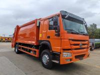 4x2 camión japonés Sinotruck Howo camión compactado de basura con 10 a 12 cbm de volumen