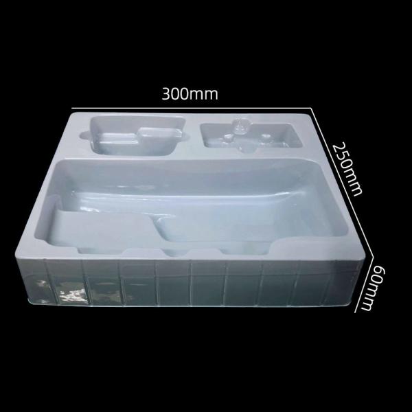 Plateau de thermoformage en PET blanc sur mesure pour l'emballage des pédales de vélo