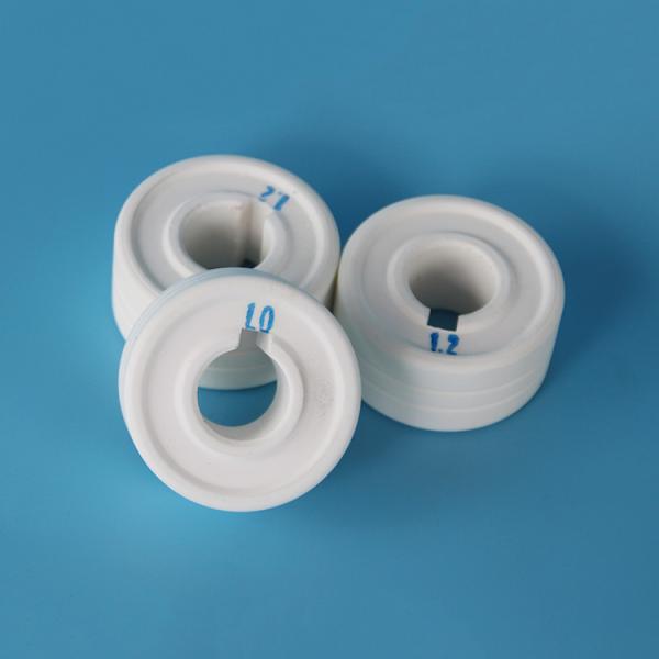 Corrosion resistant ceramics for alumina wire feeder