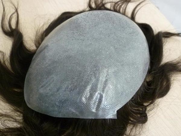 Pour les hommes, le système de coiffure à tête noire.